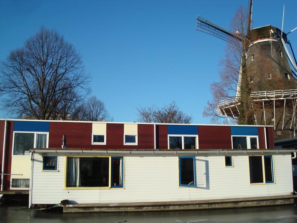 Houseboat Under The Mill Hotel Amsterdam Exterior foto